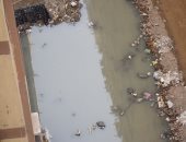 قارئ يشكو من انتشار مياه الصرف الصحى بشارع عمرو بن العاص فى الهرم