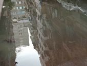 قارئ يشكو غرق شارع عثمان حفنى بفيصل بمياه الصرف الصحى