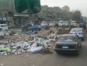 شكوى من تراكم القمامة بطريق المنصورية فى الهرم