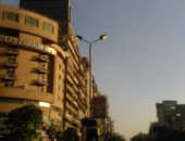 قارئ يرصد إضاءة أعمدة الكهرباء نهارا فى شارع جامعة الدول بالمهندسين