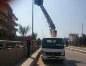 حملة لصيانة أعمدة الإنارة بكوبرى المدير ومزلقان السكة الحديد بدسوق