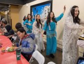 صور..بمناسبة "عيد النوروز"..أمريكيون من أصل إيرانى يقدمون الطعام للمشردين