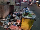 صور.. تراكم القمامة أمام مدرسة فى شارع بورسعيد بالإسكندرية ومطالب بتطهير المكان