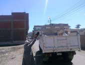 حملة نظافة ورفع المخلفات والتراكمات بشوارع مدينة طما