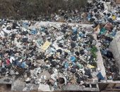 صور.. شكوى من تراكم القمامة بشارع رمزى فى الإسكندرية
