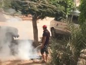 قارئ يشكو قيام عمال النظافة بحرق مخلفات الحدائق بمدينة بدر.. صور