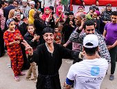 أهالى الوراق يحتفلون بالمشاركة فى انتخابات الرئاسة أمام لجنة مصطفى كامل