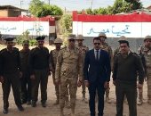 رئيس لجنة بالبحيرة وقوة التأمين يفتتحون اللجنة بأداء النشيد الوطنى