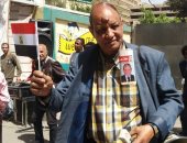  مواطن يتجول فى لجان الانتخابات الرئاسية ويغنى لـ "السيسى"