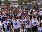 فيديو.. مسيرة لمئات الشباب لحث المواطنين على المشاركة بالانتخابات بالقاهرة