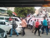 صور.. "كلنا معاك من أجل مصر" تنظم وقفة بالدقى لحث المواطنين على التصويت