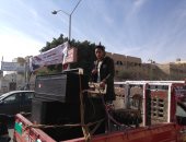 سيارات تبث الأغانى الوطنية فى شوارع أكتوبر للحث على المشاركة بالانتخابات 