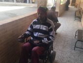 فيديو..شاب على كرسى متحرك ينتخب بالدقى ويوجه رسالة للشباب: لازم تنزلوا وتشاركوا
