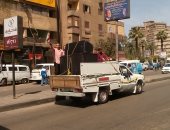 بالصور.. سيارات تجوب شوارع الجيزة لحث المواطنين على المشاركة بالانتخابات