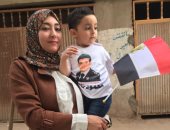 أرملة ضابط بسيناء للسيدات: "انزلوا الانتخابات علشان مصر ودماء الشهداء".. صور