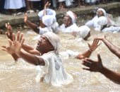 صور.. احتفالات مرعبة لمعتنقى ديانة السحر الأسود بجزر هايتى