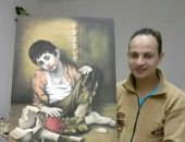فنان تشكيلى يشارك "صحافة المواطن" بلوحة الطفل اليتيم