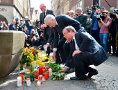 صور.. مسئولون ألمان يضعون الورود بموقع حادث الدهس فى مونستر