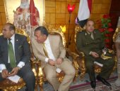 صور.. محافظ سوهاج ومدير الأمن يقدمان التهنئة لمطران دار السلام والبلينا