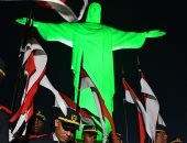 صور..تمثال "المسيح" باللون الأخضر فى البرازيل احتفالا باليوم الوطنى للجيش