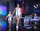 صور.. عرض أزياء المصرية  إيمى بلبع للأم وبنتها يبهر أسبوع الموضة الأردنى