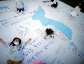 صور.. أطفال كوريا الجنوبية يرسمون خريطة للكوريتين ويطالبون بعودة العلاقات