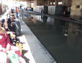 صور.. محطة أتوبيس جراج العتبة غارقة فى مياه الأمطار