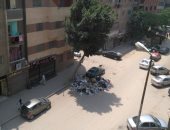 قارئ يشكو من انتشار أكوام القمامة بشارع صعب صالح فى عين شمس الشرقية