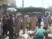 صور..مساعد محافظ كفر الشيخ يرأس حملة لإزالة الإشغالات وتجديد كابلات الكهرباء