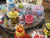 صور.. 40 طالبة بسوهاج يصنعون فوانيس رمضان وإكسسوارات من الخرز لمساعدة أسرهن