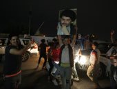 صور.. أنصار مقتدى الصدر يحتفلون بالتقدم فى نتائج الانتخابات التشريعية بالعراق