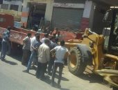 إزالة الإشغالات والتعديات على الطرق المؤدية لدير العذراء بأسيوط "صور"