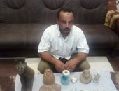 الداخلية تحبط محاولة مواطن بالمنيا تهريب 21 قطعة أثرية نادرة (صور)