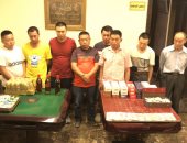 القبض على 8 صينيين أثناء لعبهم القمار داخل شقة فى المعادى