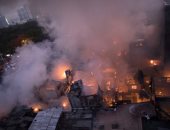 صور. حريق هائل يلتهم 200 منزل بمنطقة عشوائية بمانيلا فى الفلبين