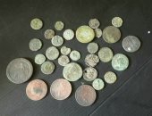 الوحدة الأثرية بميناء الإسكندرية تضبط 30 عملة معدنية تعود للعصر الرومانى