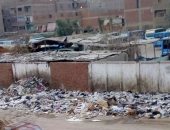 صور.. شكوى من انتشار القمامة بمساكن إسكو حى شرق فى شبرا الخيمة