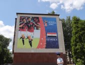 شاهد.. صور عبد الله السعيد والننى تزين شوارع جروزنى قبل كأس العالم