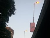 قارئ يرصد إضاءة أعمدة الإنارة نهارا على كوبرى 6 أكتوبر