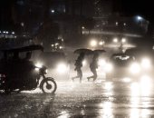 صور.. أمطار غزيرة ورياح قوية تضرب الفلبين جراء إعصار "ماليكسى"