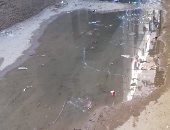 شكوى من طفح مياه الصرف فى شارع عمر بن الخطاب بفيصل