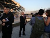 شاهد.. شخصان يتنكران فى هيئة بوتين وزعيم كوريا الشمالية بملاعب روسيا