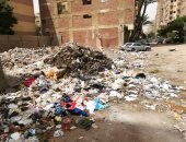 قارئ يرصد بالصور.. القمامة تحاصر الجيزة وغياب اهتمام المسئولين