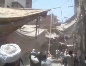 صور.. حملة لإزالة اشغالات الباعة الجائلين واستكمال رصف الشوارع فى أسيوط