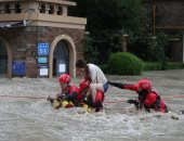 صور.. الفيضانات فى الصين تسبب دمارا وتسد الطرق والسكك الحديدية