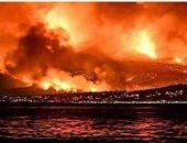 صور.. الصيادون المصريون باليونان ينقذون 70 شخصا من حريق فى إحدى المدن