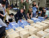 صور.. الأمم المتحدة تشرف على عمليات إعادة رفات الجنود الأمريكيين من بيونج يانج