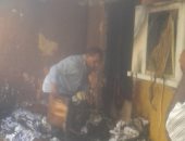 صور.. السيطرة على حريق فى مكتب بريد أرمنت الوابورات غربى الأقصر