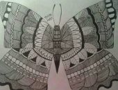 سلمى تتلاعب بالأشكال الهندسية لرسم لوحاتها.. وتؤكد: مجموعى حرمنى من فنون جميلة