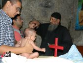 "اليوم السابع" يرصد تعميد الأطفال فى بمولد السيدة العذراء بدير درنكة بأسيوط
